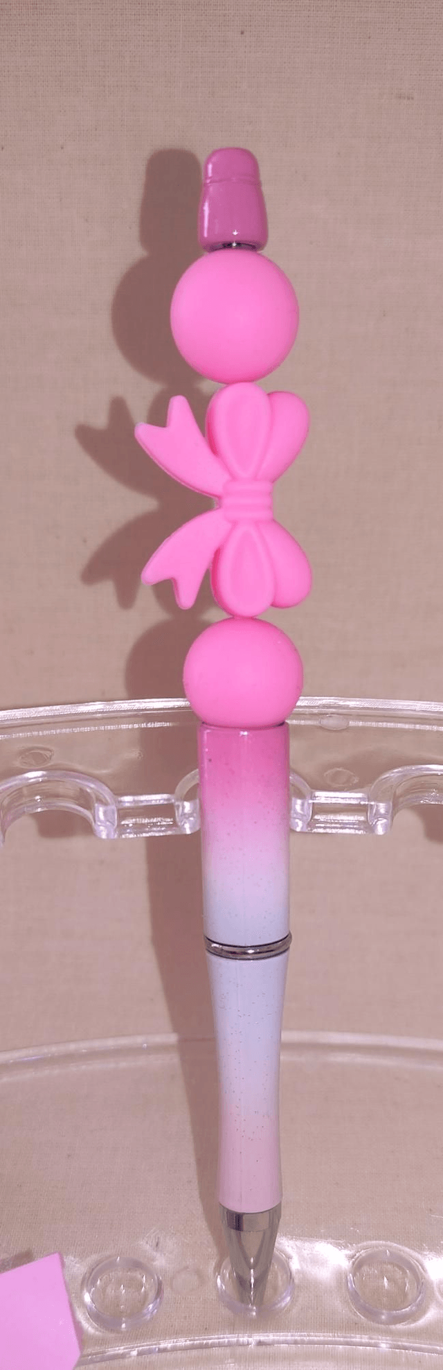 Stylo perle silicone rose pailleté 