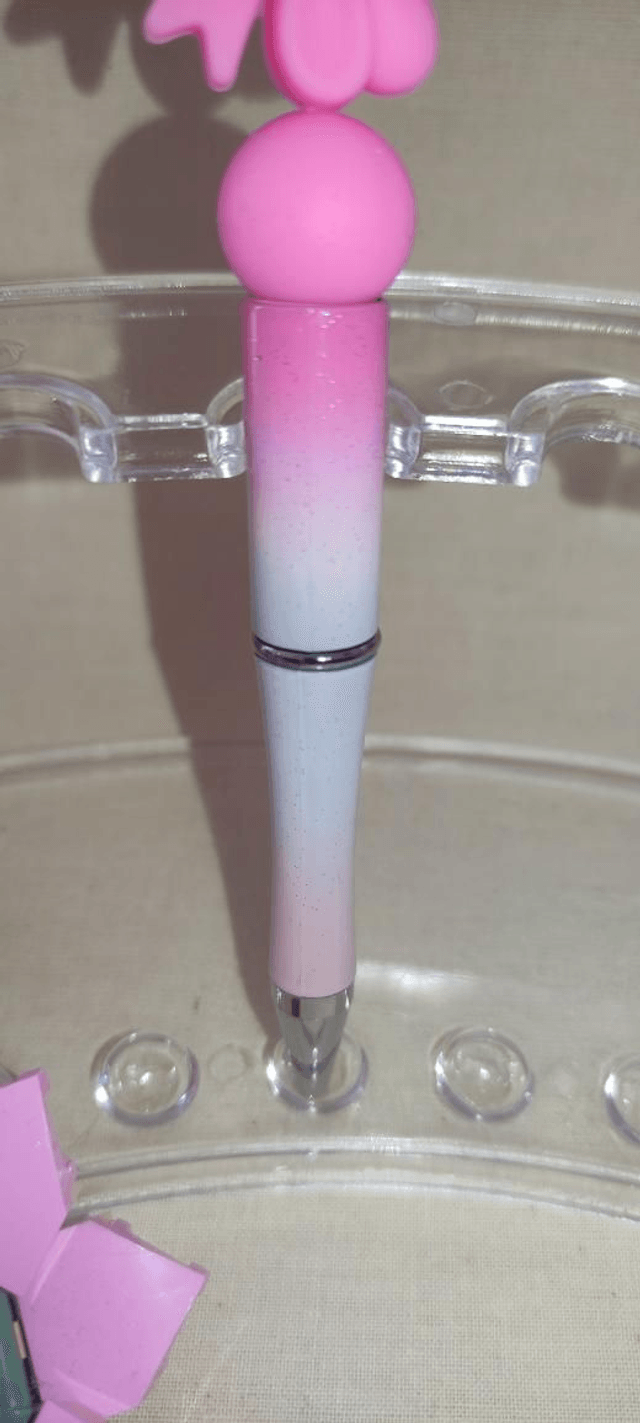 Stylo perle silicone rose pailleté 