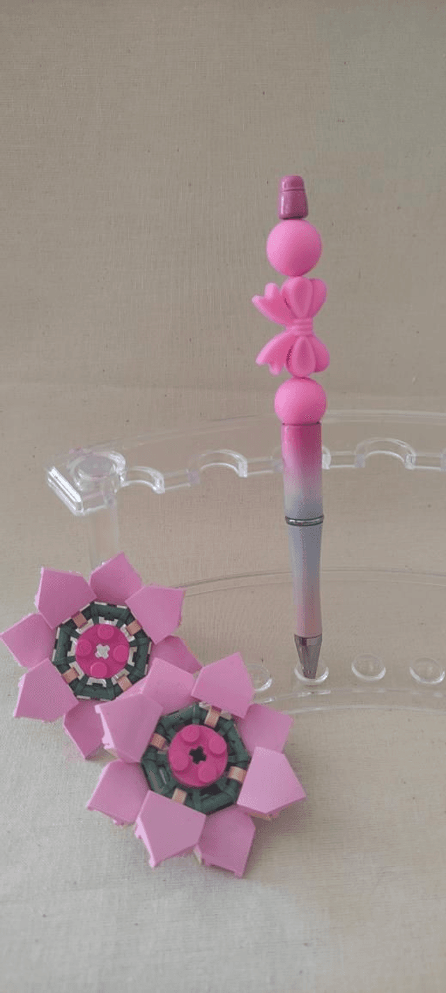 Stylo perle silicone rose pailleté 